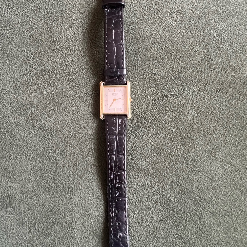 Gold colored and Black Crocodile Leather Watch